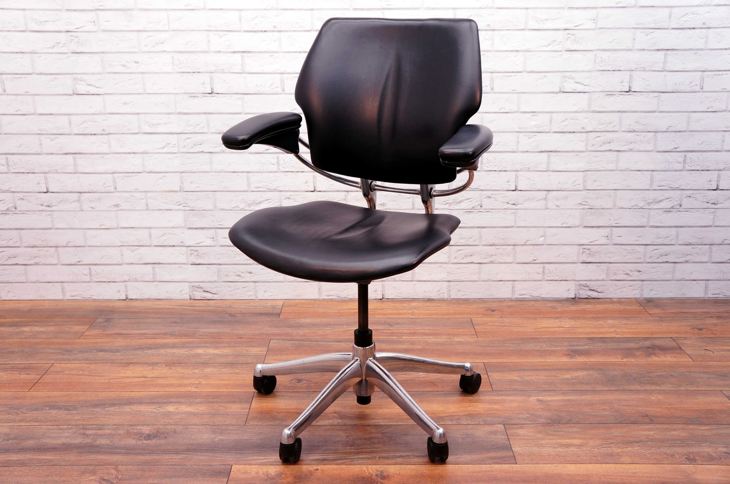 humanscale freedom task chair in black faux leather with polished aluminium  frame